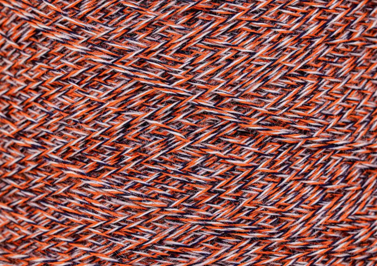 Twisted and plied yarn