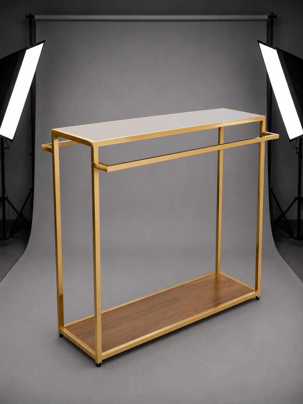 Double-sided gold metal garment rail with upper and lower wooden shelves, fitting-room and store organizer