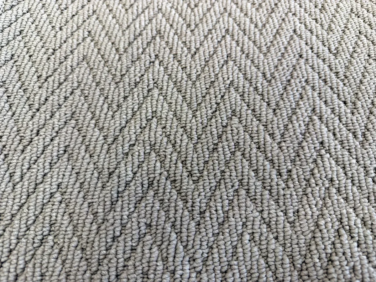 Assos loop pile carpet with herringbone texture