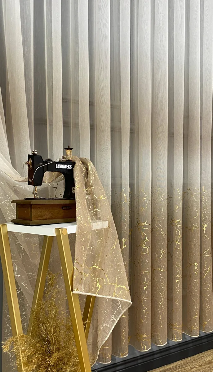 Olympos mink-beige tulle curtain with gold foil print